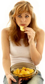 Lady eating refined foods is placing herself at risk of hemroids / hemorrhoids / piles
